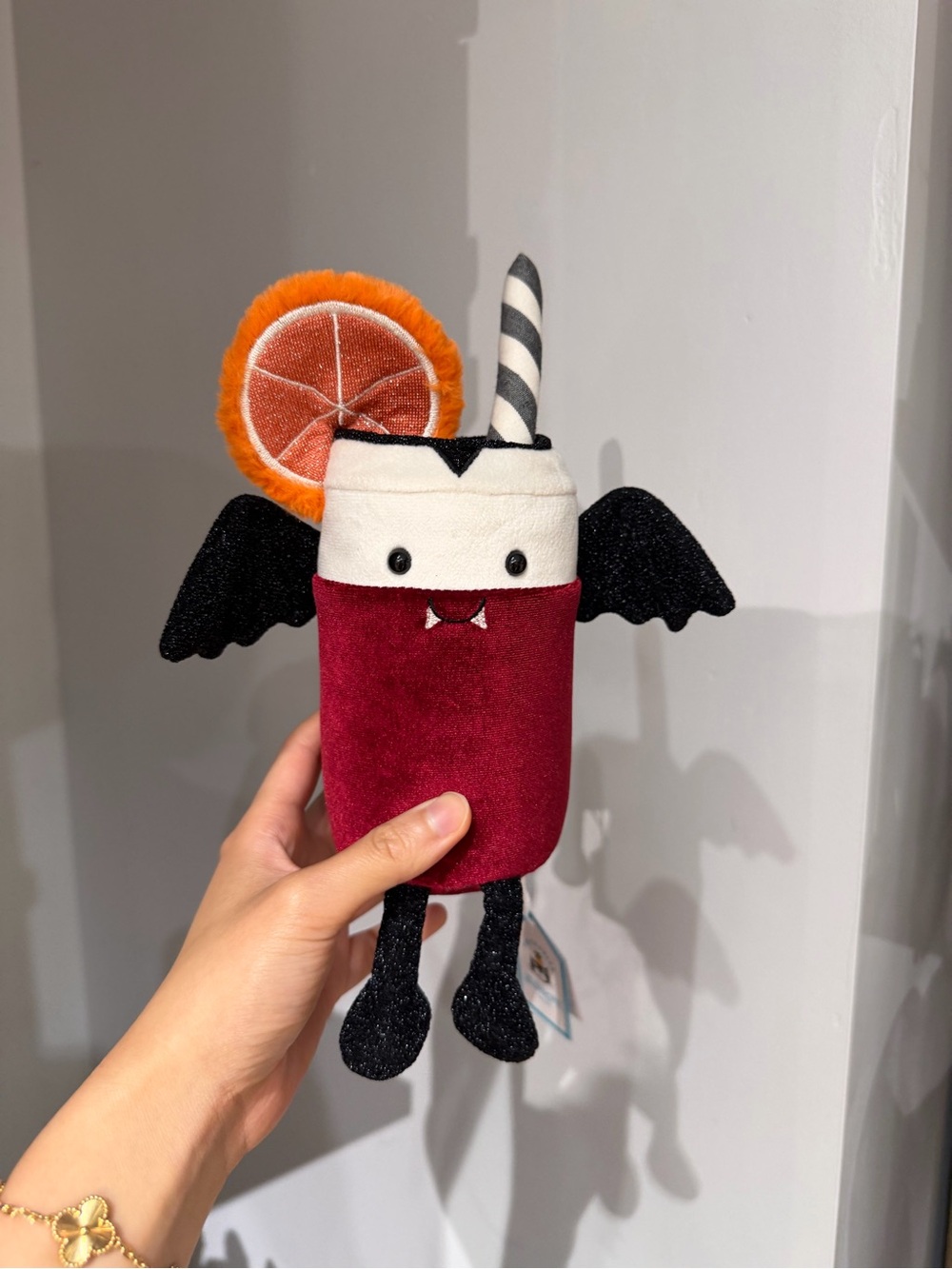 Jellycat Burgundy Vampire Drink Plush with Black Wings & Orange Slice